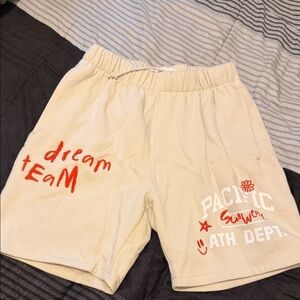 PacSun Cream Graphic Shorts with Red Accents